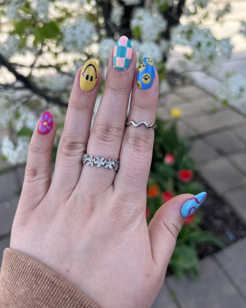 Happy Days: mixed art with a smiley face, checkerboard and flowers